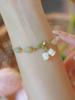 Pulsera Sueño de Flor Lirio de los Valles Jade Hetian Natural Nuevo Estilo Chino para Mujer Concha Blanca Lirio de los Valles Pulsera Estudios Chinos Tendencia Nacional Regalo Exquisito