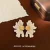 Pendientes de gota de aceite con flores retro de color 2024, nuevos pendientes de moda de nicho con diseño de personalidad y temperamento de otoño e invierno.