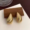 Brincos exagerados em forma de C de gota d'água vazados, transfronteiriços europeus e americanos, com sensação de luxo leve e alta qualidade, brincos da moda com design único