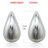 Europa y Estados Unidos muestran transfronterizamente aretes retro estilo punk de lágrima de coma, aretes colgantes simples y suaves de nicho