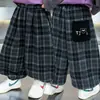 Pantalones de Cuadros con Bolsillo de Oso para Niños Primavera y Otoño 2026 Nuevo Otoño Estilo Coreano Frescos Pantalones Casuales para Bebé Pantalones Deportivos Modernos