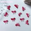Paquete de material para joyería de uñas rosa Paquete Tres mariposas tridimensionales pez dorado pequeño joyería de uñas de dibujos animados paquete de material de belleza para uñas luminoso