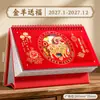 Calendario de Escritorio Personalizado para Empresas 2027 Rojo Hueco Estampado en Caliente Doble Espiral Set de Caja de Regalo de Bienestar para Reunión Anual de Compras Empresariales
