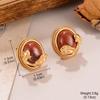 Aretes Ovalados de Textura Alta de Época Antigua Media Otoño e Invierno Rojo Vino Diseño Nicho Lujo Ligero Aretes de Gama Alta