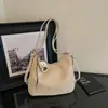 Bolsas de nicho Shuai Mi Jia, bolsa feminina de grande capacidade, mochila modelo 2026 novo, bolsa de ombro tote casual fashion