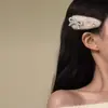 Encontro Quente de Inverno~Outono/Inverno 2026 Novo Estilo Coreano Presilha de Cabelo de Pelúcia com Laço Grampo de Cabelo Lateral Doce e Versátil Acessório de Cabelo