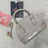 2025 Outono e Inverno Novo Estilo Coreano Moda Retrô Bolsa Concha Portátil Casual Casual Ombro Mensageiro Bolsa Feminina
