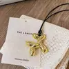 Collar con colgante de perro globo estilo Jackson Wang para mujer, cadena para suéter, accesorio de cadena para el cuello de alta gama, joyería de cadena para la clavícula de pareja