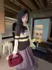 YX roupas infantis suéter para meninas 2026 outono novo estilo coreano bloqueio de cor listra ondulada suéter de manga curta versátil e moderno