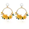 Aretes de Flor Estilo Coreano de Moda Mismo Estilo Ins para Mujer Dulces Aretes de Perla de Cerámica Blanda Aretes de Flor para Mujer Estilo Caliente