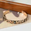 Pulsera de Sol, Luna y Estrellas en Relieve de Venta Caliente Transfronteriza, Pulsera Abierta Versátil y Elegante de Estilo Bohemio