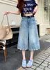 Foto real Jeans feminino de sete pontos largos com lavagem amassada estilo retrô americano novo cintura alta slim reto capris de sete pontos