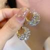 Exquisitos pendientes franceses de alta gama con forma de cesta de circonita y diseño de nicho, con hebilla de oreja y diamantes.