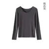 Conjunto de ropa interior térmica de doble protección contra el frío, de hilo ultra fino para mujer, nuevo otoño/invierno, color liso, versátil, amigable con la piel, sin costuras, top y pantalón de otoño para mujer