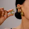 Brinco de Clipe Letra C Europeu e Americano com Superfície Fotossensível Metálica, Fio Torcido Plissado, Estiloso, Nicho, Elegante, de Alta Qualidade para Mulheres