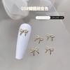 Mini Accesorios Metálicos de Moño para Uñas 2024 Nuevo Rosa Crema Japonés Cinta Revoloteante Combinada con Decoración Dorada para Uñas