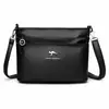 Bolso de mujer 2026 nuevo estilo bolso de hombro de mujer para ir al trabajo, simple y de gran capacidad, adecuado para madres de mediana edad para el trabajo y el commuting, bolso cruzado