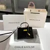 Una generación de bolsa Kelly de textura de alta calidad 2025 nueva bolsa portátil de textura de alta calidad bolsa cruzada al por mayor