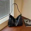 Bolso de hebilla de cinturón vintage de alta calidad para mujer, nuevo bolso versátil 2026 para hombro cruzado de viajero, bolso casual de axila