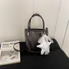 Bolso versátil de primavera y verano para mujer 2026 nueva moda bolso cubo desgastado de moda bolso cruzado texturizado elegante