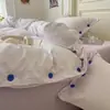 Conjunto de Quatro Peças Jacquard Tingido em Fio Lavado com Botões Coloridos, Listrado, Estilo Minimalista de Peso Elevado, Novo 2026