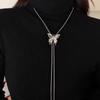 Cadena para suéter de Ojo de Tigre Perla Saturno Dibujable para mujer 2024 otoño e invierno nuevo sentido de diseño de lujo ligero cadena de clavícula de alta gama