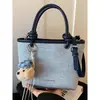 Bolsa Balde Portátil de Grande Capacidade para Mulheres 2026 Novo Estilo de Verão High-End Luxo Leve Nicho Versátil para o Dia a Dia Bolsa de Ombro