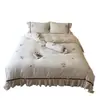 Juego de cuatro piezas de algodón y lino bordado estilo retro wabi-sabi, funda nórdica y fundas de almohada teñidas en hilo, amigable con la piel y apto para dormir desnudo, ropa de cama para todas las estaciones