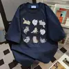 Camiseta Curta Estilo Ins Graffiti Gato Estampa de Letras para Mulheres, Novo Casual Solto de Verão 2026