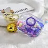 Llavero de aceite de botella de arena movediza acrílica, regalo al por mayor, colgante para mochila escolar, cuentas de colores bonitas, llavero colgante de arena movediza