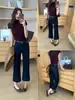 Otoño TOP Estilo Europeo Guangzhou Trece Filas Originales Jeans Capri de Mezclilla Antidescoloración Elásticos de 8 Puntos con Cinturón 82616
