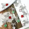 Nuevo Estilo de Lujo Ligero Celebridad de Internet Corazón Lazo Arte de Uñas Rhinestone Hueco Colgante Diseño Portátil Uñas DIY Accesorios Mayoreo