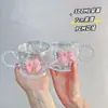 Venta al por mayor del fabricante Taza de vidrio de aspecto elegante para verano Taza con pajita de mariposa rosa para té de frutas con asa Gran cantidad Preferencial