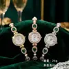 Reloj Pulsera Zirconia Colorido Nuevo al por Mayor Punto de Venta Sensación de Alta Gama Transfronterizo Retro Cuarzo Temperamento Reloj Incrustado con Diamantes para Mujer