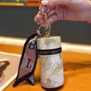 Bolsa de moedas criativa estilo nacional moda balde pequena transparente flor portátil fone de ouvido boca envelope vermelho chave do carro pingente