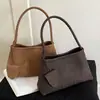 Bolso tejido de nicho estilo francés Ruien para mujer, nuevo bolso de hombro vintage de moda para commuting otoño 2026