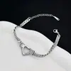 Collar Hueco de Corazón Personalizado de Lujo Ligero para Mujer Cadena de Clavícula de Acero de Titanio de Moda Tendencia Estilo Nuevo