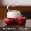 Una persona con un cuenco taza rápida viaje juego de té individual traje olla gruesa una taza compañero de negocios regalo bolsa de almacenamiento