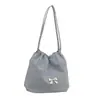 Bolso de Hombro Elegante de Alta Apariencia Estilo Coreano Primavera 2026 Nueva Moda Bolso Cubo con Cordón de Lazo de Gran Capacidad para Mujer