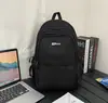 Mochila Casual Lisa Estilo Minimalista Cor Vinho Retrô para Alunos do Ensino Fundamental II e Médio Tendência Americana Personalidade Cool Mochila Versátil