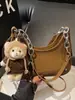 Bolso de Alto Valor Estilo Coreano Otoño 2026 Nuevo Lanzamiento Bolso de Cadena de Nicho Bolso Baguette para Debajo del Brazo Bolso de Hombro Sencillo y Elegante Bolso Cruzado