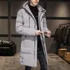 Nuevo abrigo acolchado de algodón de longitud media engrosado para hombre 2023 abrigo acolchado de algodón de moda estilo coreano de invierno abrigo acolchado de algodón largo cálido para hombre
