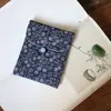 Muestra de pedido final se puede pedir bolsa de tela de brocado para regalo bolsa Wenwan estilo japonés bolsa de almacenamiento de joyas billetera plegable tela