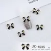 Nueva Celebridad de Internet Pequeño Estilo Chanel Arte de Uñas Joyería de Aleación Perla de Aceite Lazo Diamantes para Uñas Negros y Blancos Adornos Salida de Fábrica