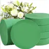 Venta al por mayor de fábrica material de embalaje de espuma floral redonda espuma floral seca reforzada espuma floral cilíndrica absorbente fuerte para arreglos florales bloque de espuma floral fresca