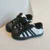 Zapatillas Deportivas Infantiles Shell Head con Forro Polar para Abrigo Otoño/Invierno 2026 Nuevas Llegadas Niños Niñas Suela Suave Antideslizantes Casuales para Patineta