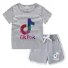Camiseta de cuello redondo para niños, pantalones cortos, camiseta informal coreana, conjunto de camiseta interior absorbente de sudor, de caramelo, de verano 2023
