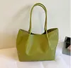 Bolso de mano tejido de diseño de nicho transfronterizo para mujer, nuevo estilo 2026, con temperamento, casual, gran capacidad, para el trabajo, de un solo hombro, para llevar debajo del brazo