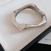 Pulsera Retorcida de Metal Irregular de Venta Caliente Transfronteriza Europea y Americana Estilo Ins Pulsera de Tacto de Alta Gama Sentido de Diseño de Nicho Joyería de Mano