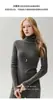 Suéter de punto de cuello alto estilo nuevo 100% cachemir Bai Cai Rong otoño/invierno 2026 nuevo jersey básico de punto acanalado ajustado